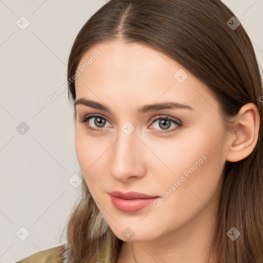 Neutral white young-adult female with long  brown hair and brown eyes