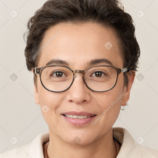 Joyful white adult female with short  brown hair and brown eyes