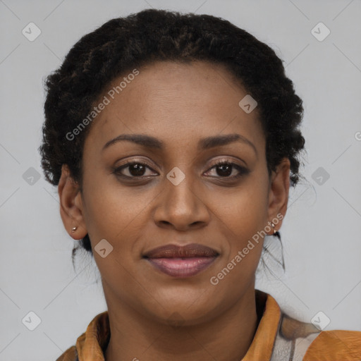 Joyful black young-adult female with short  brown hair and brown eyes