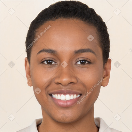 Joyful black young-adult female with short  black hair and brown eyes