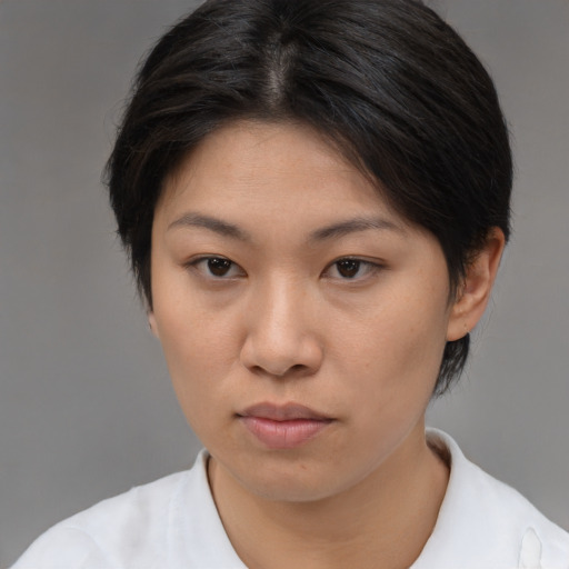 Neutral asian young-adult female with medium  brown hair and brown eyes