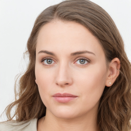 Neutral white young-adult female with long  brown hair and blue eyes