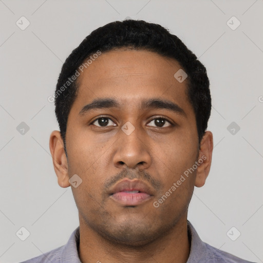 Neutral latino young-adult male with short  black hair and brown eyes
