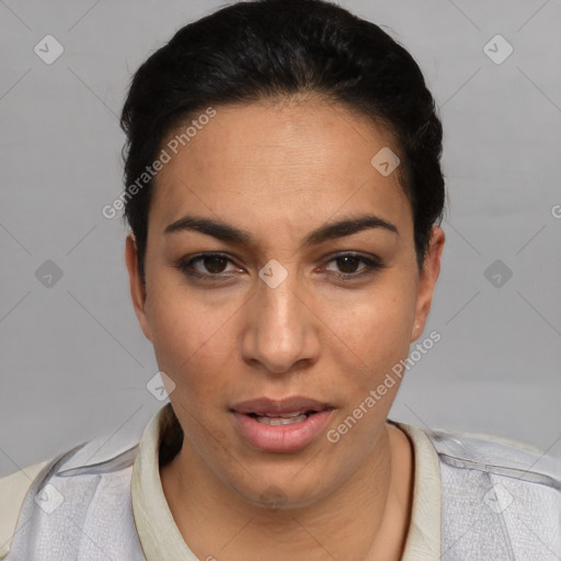 Joyful latino young-adult female with short  black hair and brown eyes