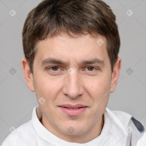 Joyful white adult male with short  brown hair and brown eyes