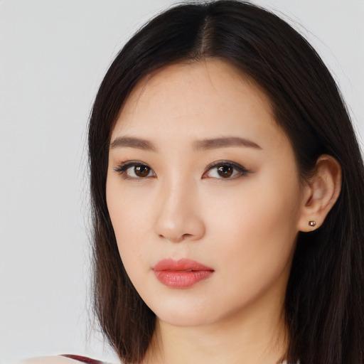 Neutral asian young-adult female with long  black hair and brown eyes