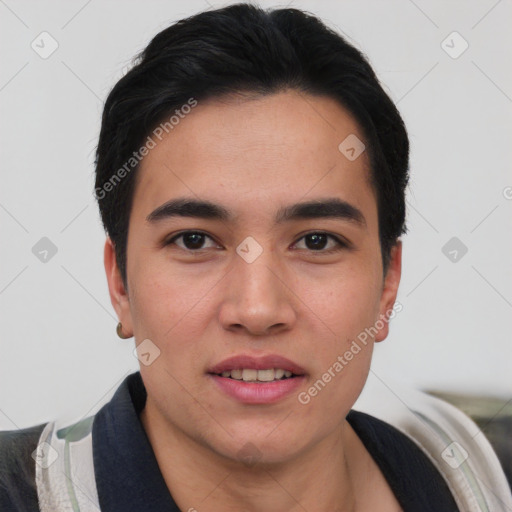 Joyful asian young-adult male with short  black hair and brown eyes