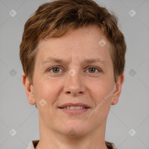 Joyful white adult male with short  brown hair and grey eyes