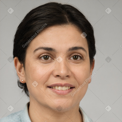 Joyful white adult female with short  brown hair and brown eyes