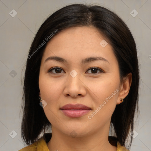 Joyful asian young-adult female with medium  brown hair and brown eyes