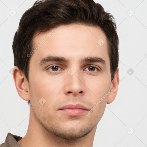 Neutral white young-adult male with short  brown hair and brown eyes