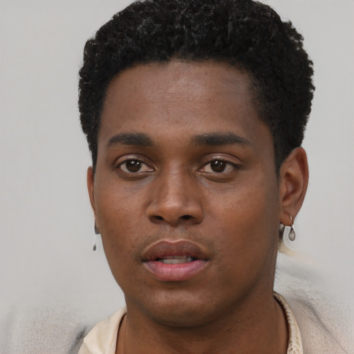 Neutral black young-adult male with short  black hair and brown eyes