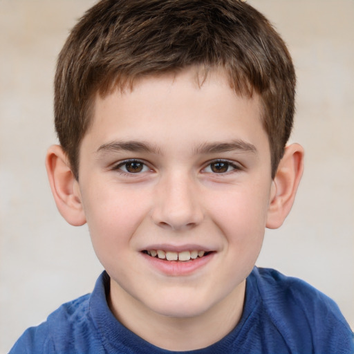 Joyful white child male with short  brown hair and brown eyes