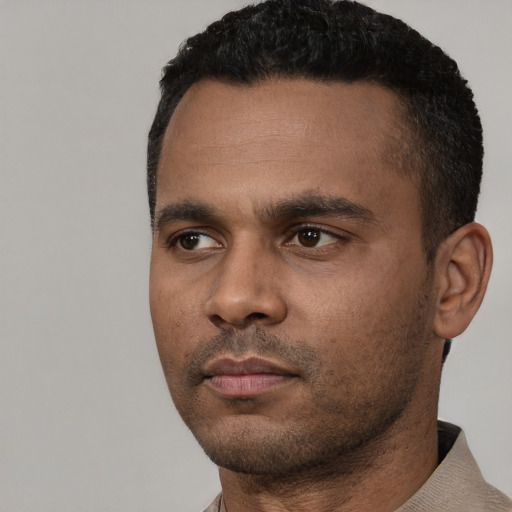 Neutral latino young-adult male with short  black hair and brown eyes