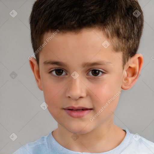 Joyful white child male with short  brown hair and brown eyes