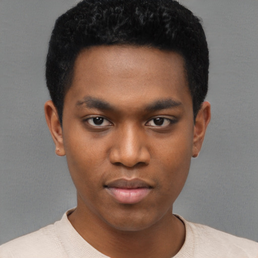 Neutral black young-adult male with short  black hair and brown eyes