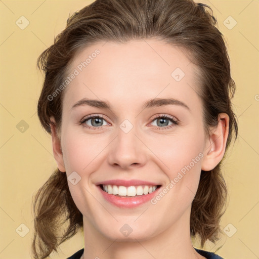 Joyful white young-adult female with medium  brown hair and green eyes