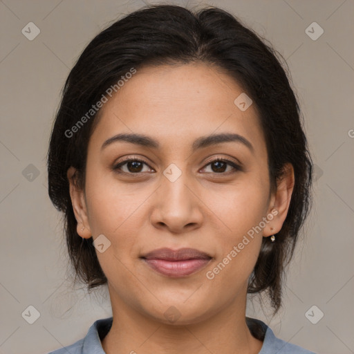 Joyful latino young-adult female with medium  brown hair and brown eyes