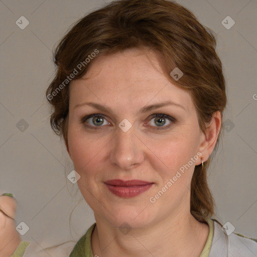 Joyful white young-adult female with medium  brown hair and blue eyes