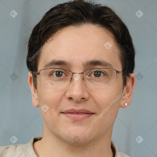 Joyful white adult male with short  brown hair and brown eyes