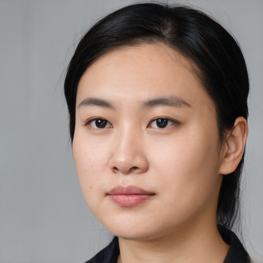 Neutral asian young-adult female with long  black hair and brown eyes