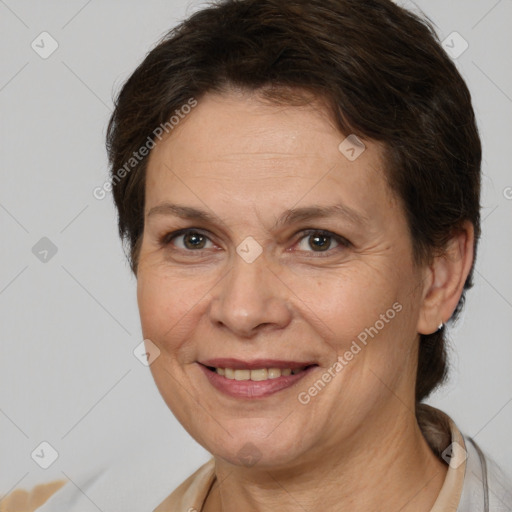 Joyful white adult female with medium  brown hair and brown eyes