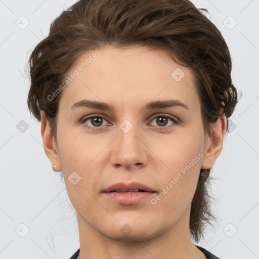 Neutral white young-adult female with short  brown hair and brown eyes