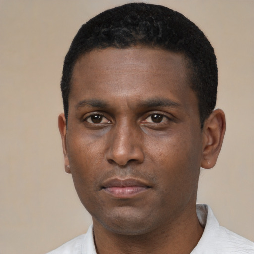 Neutral black young-adult male with short  black hair and brown eyes