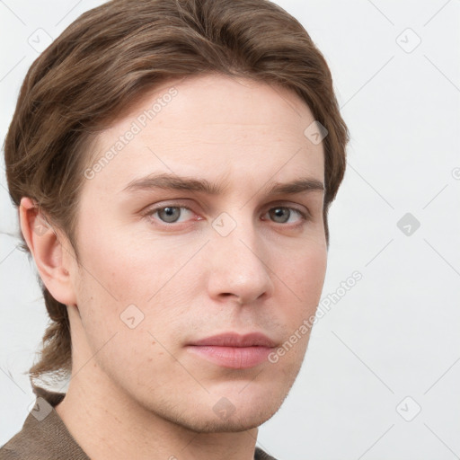 Neutral white young-adult male with short  brown hair and grey eyes