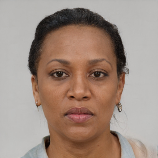 Neutral black adult female with short  brown hair and brown eyes