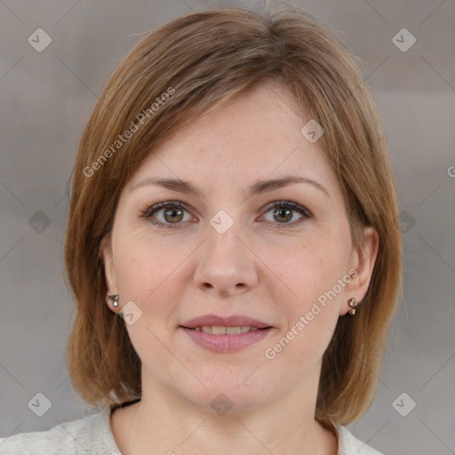 Joyful white young-adult female with medium  brown hair and grey eyes