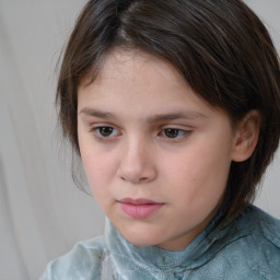 Neutral white child female with medium  brown hair and brown eyes