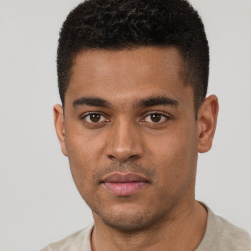 Neutral black young-adult male with short  black hair and brown eyes