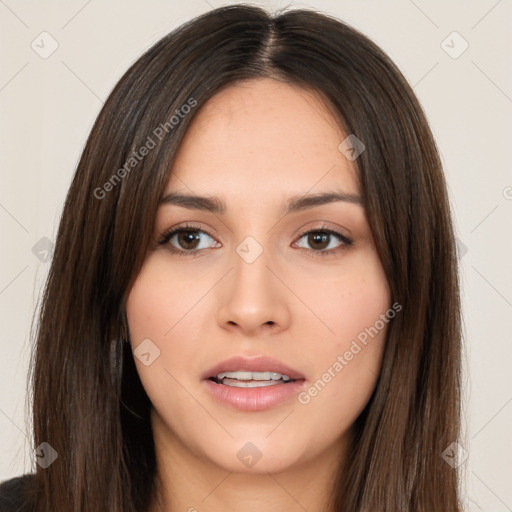 Neutral white young-adult female with long  brown hair and brown eyes