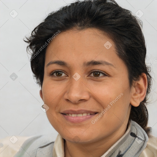 Joyful latino young-adult female with short  brown hair and brown eyes