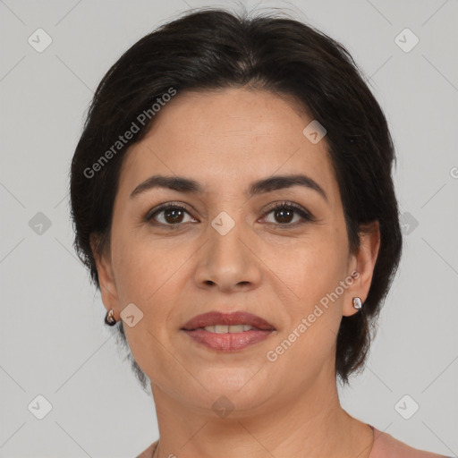 Joyful white adult female with medium  brown hair and brown eyes