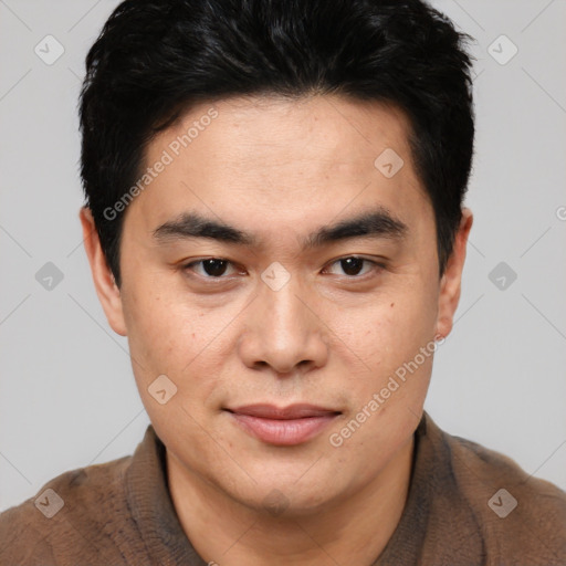 Joyful asian young-adult male with short  brown hair and brown eyes