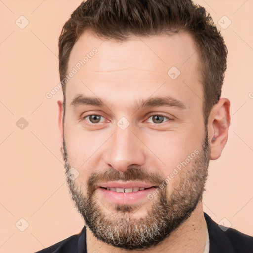 Joyful white young-adult male with short  brown hair and brown eyes