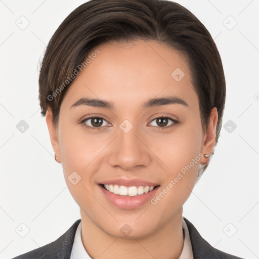 Joyful white young-adult female with short  brown hair and brown eyes