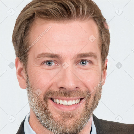 Joyful white adult male with short  brown hair and grey eyes