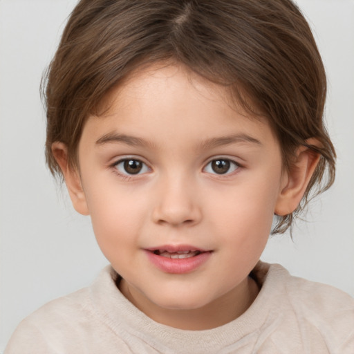 Joyful white child female with medium  brown hair and brown eyes