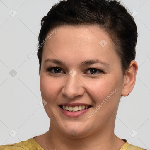 Joyful white young-adult female with short  brown hair and brown eyes