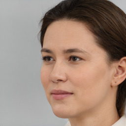 Neutral white young-adult female with medium  brown hair and brown eyes