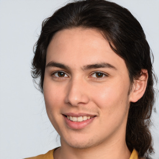 Joyful white young-adult male with medium  brown hair and brown eyes