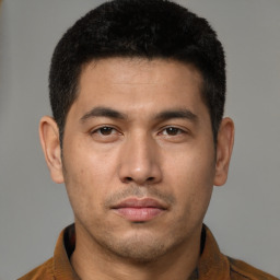 Neutral asian young-adult male with short  brown hair and brown eyes