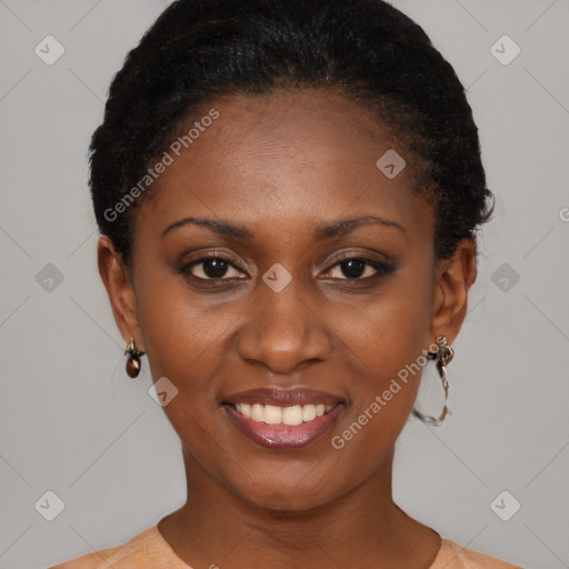 Joyful black young-adult female with short  brown hair and brown eyes