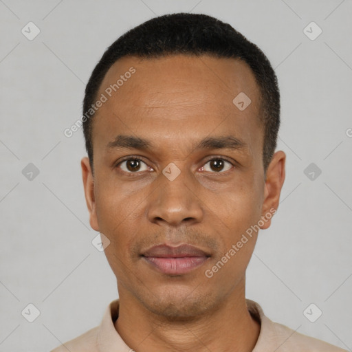 Neutral black adult male with short  black hair and brown eyes