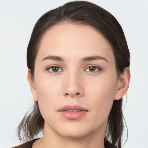 Neutral white young-adult female with medium  brown hair and brown eyes