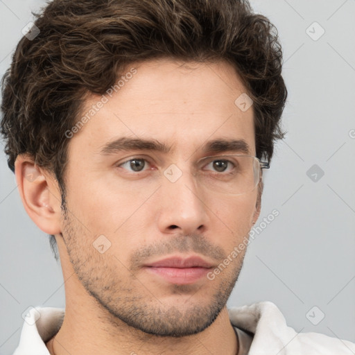 Neutral white young-adult male with short  brown hair and brown eyes