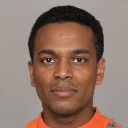 Neutral black young-adult male with short  black hair and brown eyes